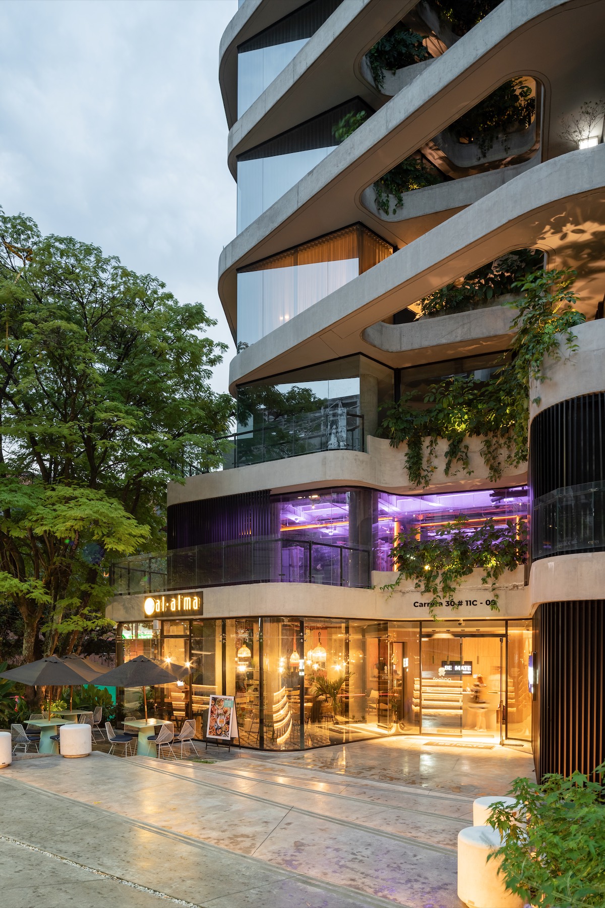 FEELING entrance and Al Alma café at dusk
